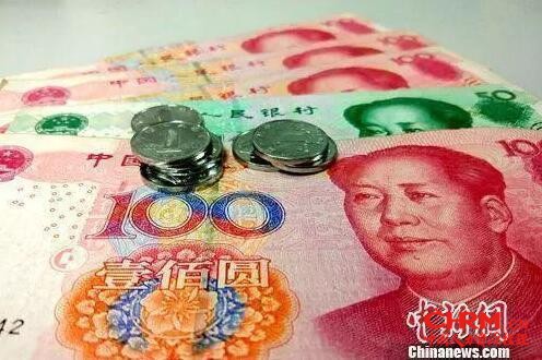 资料图：人民币。中新网记者 李金磊 摄